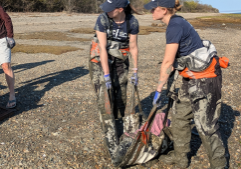 WDC's Marine Animal Rescue and Response team transport a deceased Atlantic white-sided dolphin. Credit: WDC